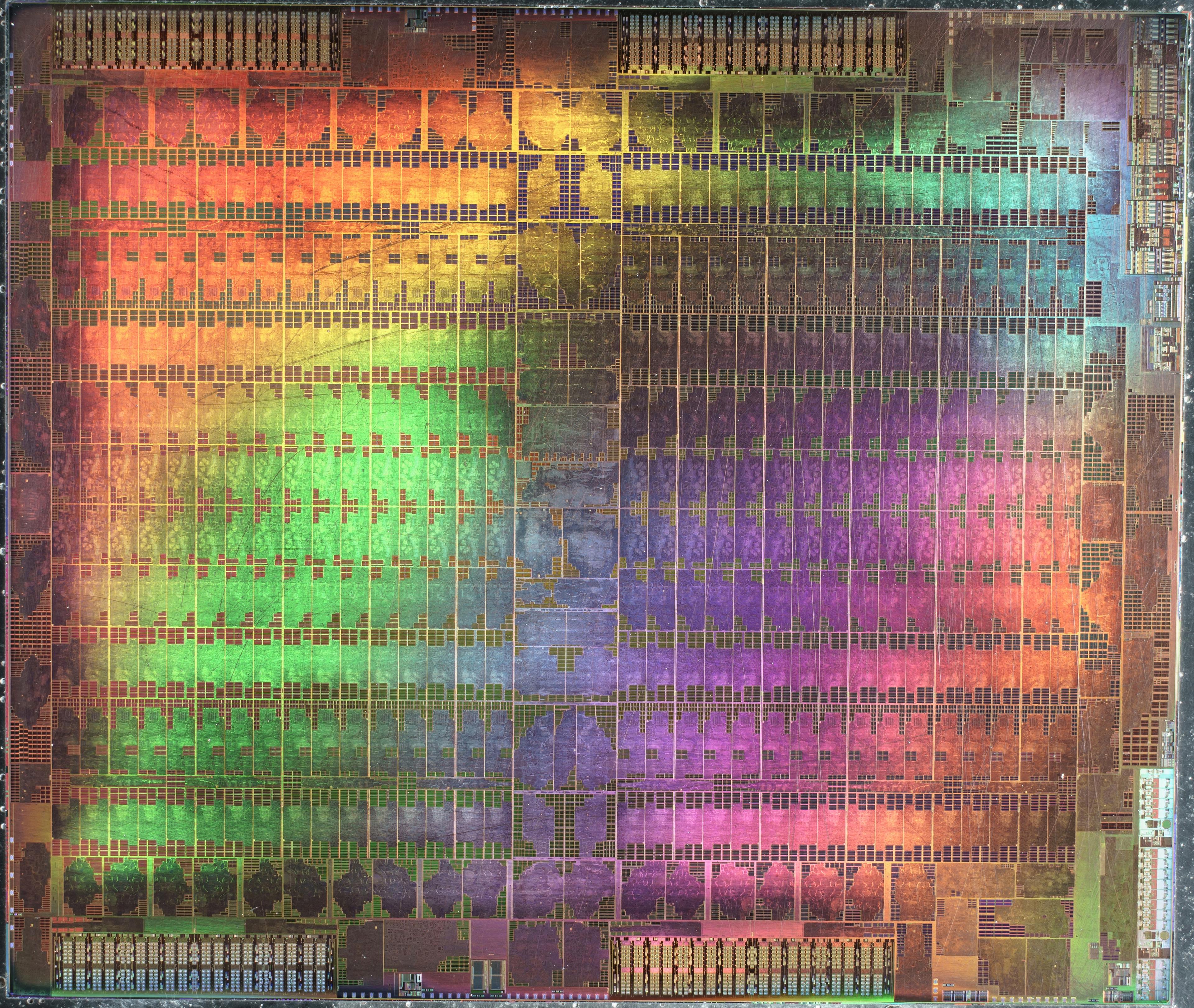 Abstract microscopic photography of a Graphics Processing Unit in rainbow colors
